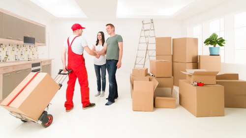 Loading furniture and boxes into a moving van