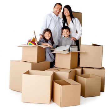 Moving team carrying furniture during a van relocation job